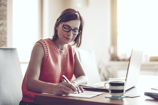 Business management professional sitting at desk