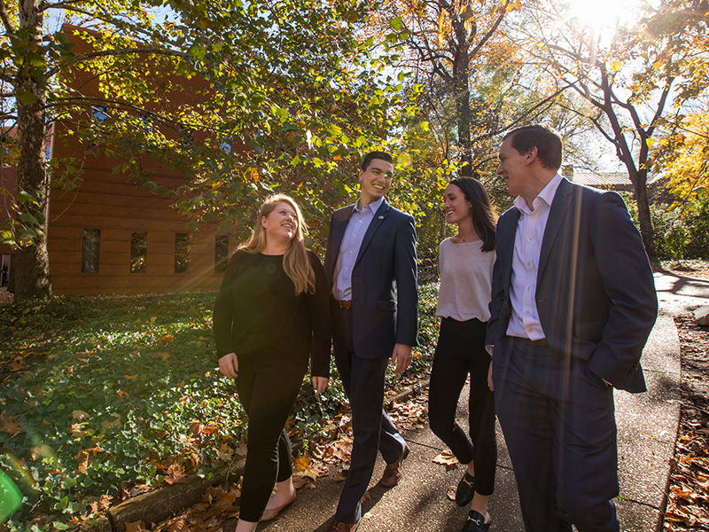 Students and faculty walking on campus